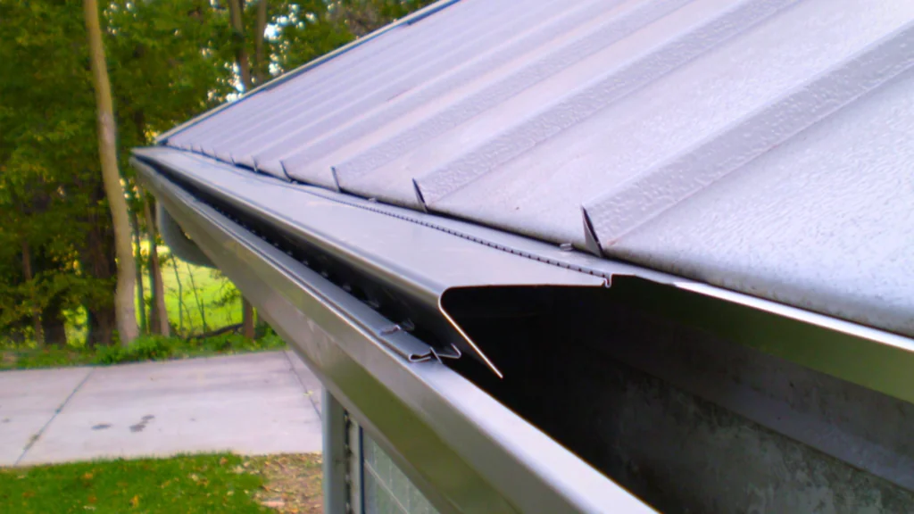 Gutter system on a residential roof, showcasing LeafX® clean gutter guard technology for effective water management and maintenance reduction.