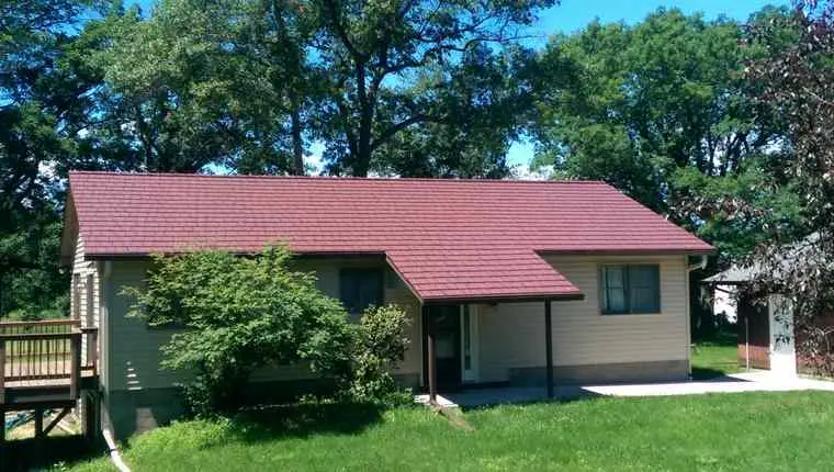After photo of newly installed asphalt shingle roof