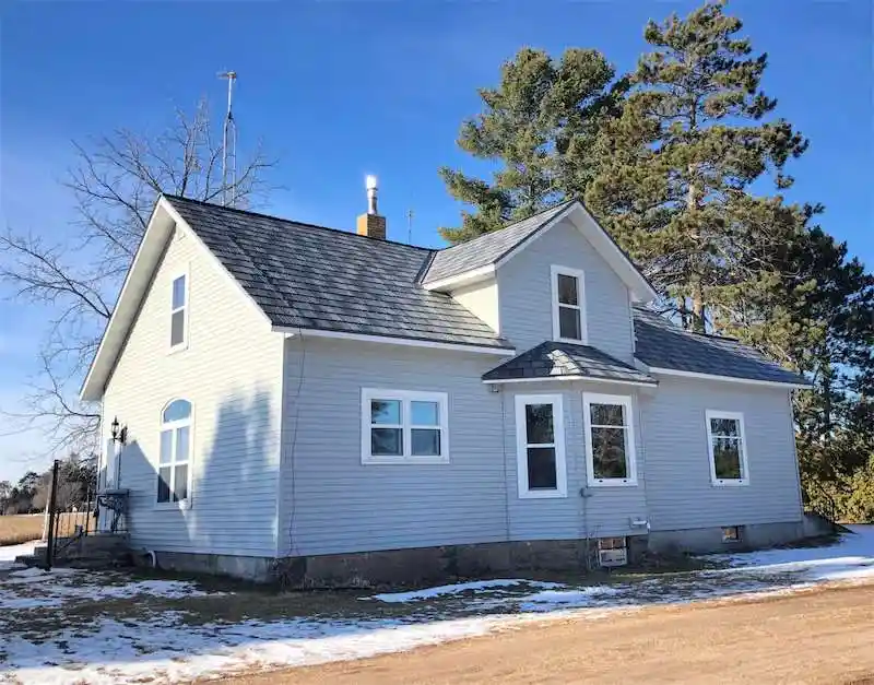 After photo of a completed asphalt shingle roof replacement