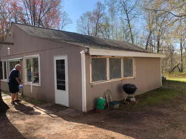 Before photo of an exterior home siding replacement project