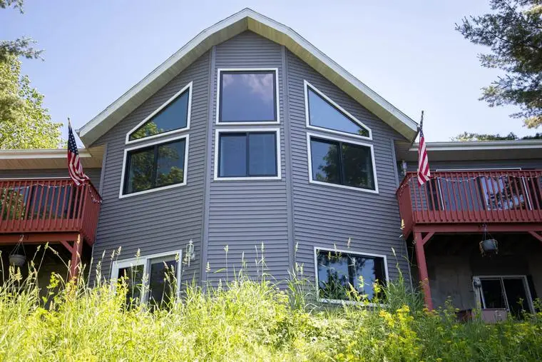 After photo of energy-efficient replacement windows installed by Engstrom Siding & Window