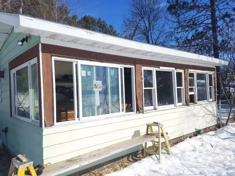 Before photo of home before installing new replacement windows