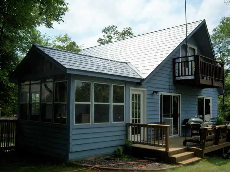 Before photo of home before installing new replacement windows